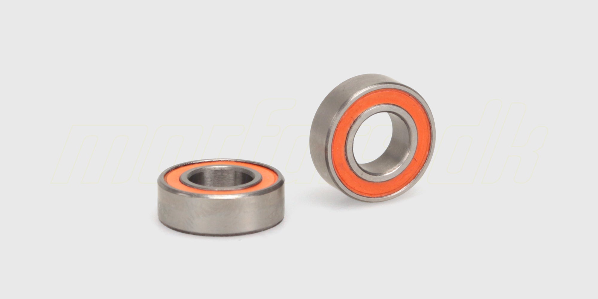 To præcisionsfremstillede 6x12x4 mm kuglelejer til fjernstyrede biler vist på hvid baggrund.