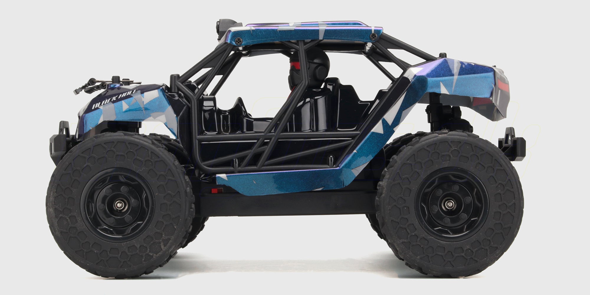 Hurricane Rock Rocker med blå karrosse og offroad hjul set fra siden med hvid baggrund