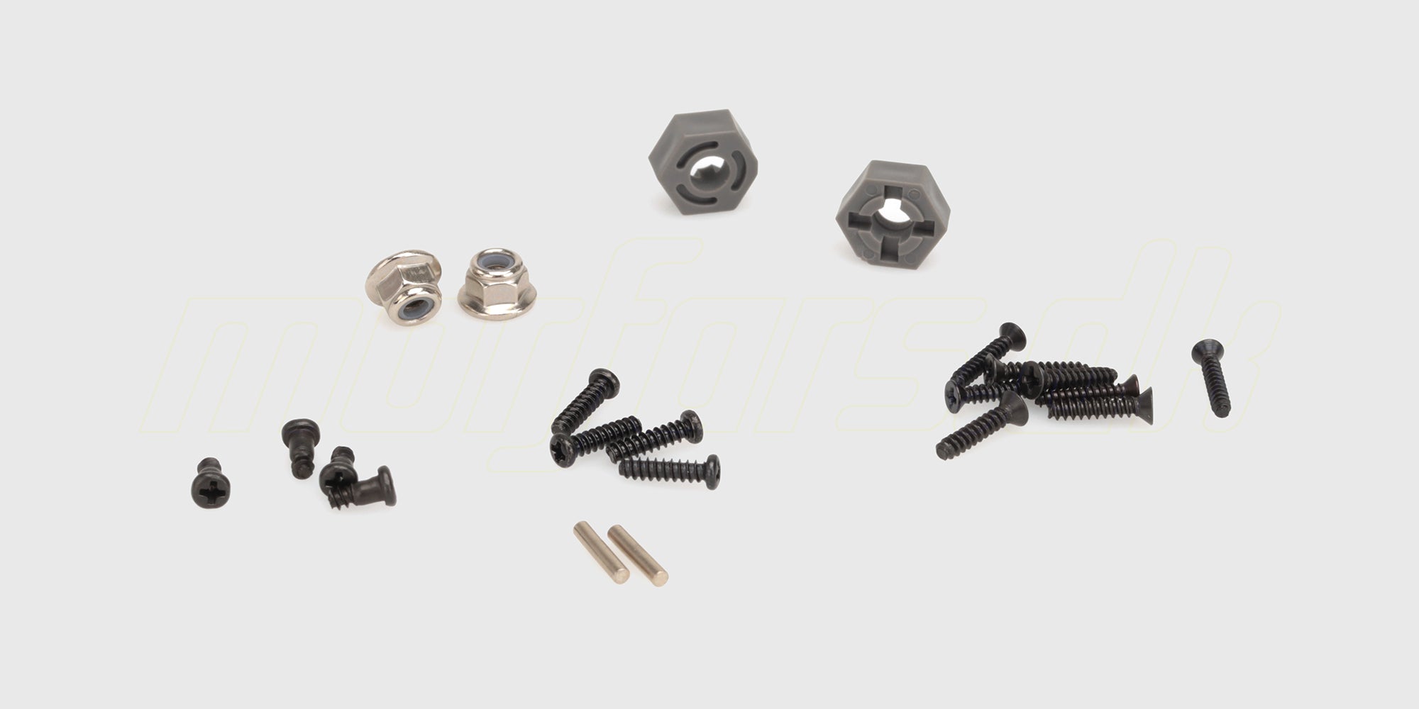 Komplet skruesæt til MJX HyperGo fjernstyrede biler med forskellige typer metalskruer i en gennemsigtig plastboks.