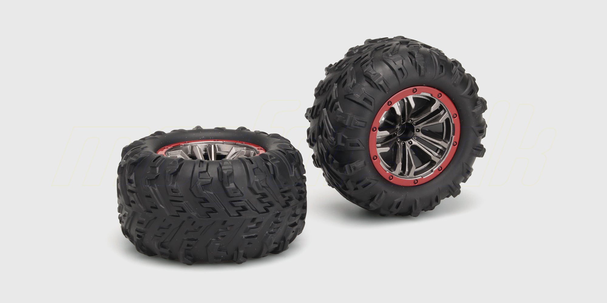 To sorte XLH Tires dæk med groft mønster og sorte fælge til XLT Race Truck fjernstyret bil.