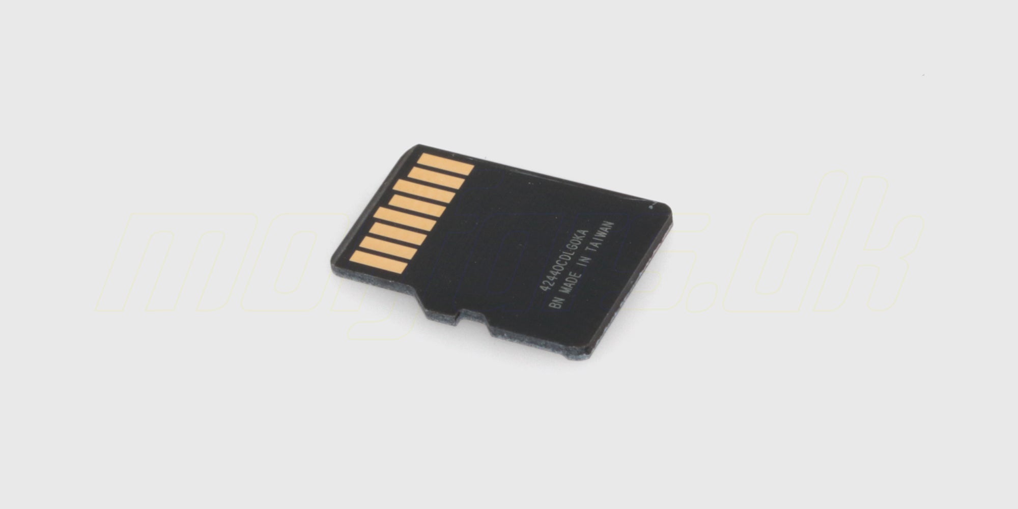 SanDisk 64GB Extreme microSDXC hukommelseskort vist tæt på med tydelig tekst og logo på hvid baggrund.