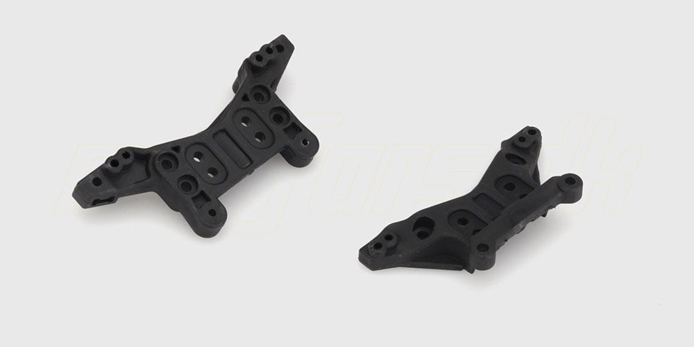 To sorte Ravage shock towers i robust plast til montering af affjedring på en fjernstyret bil.