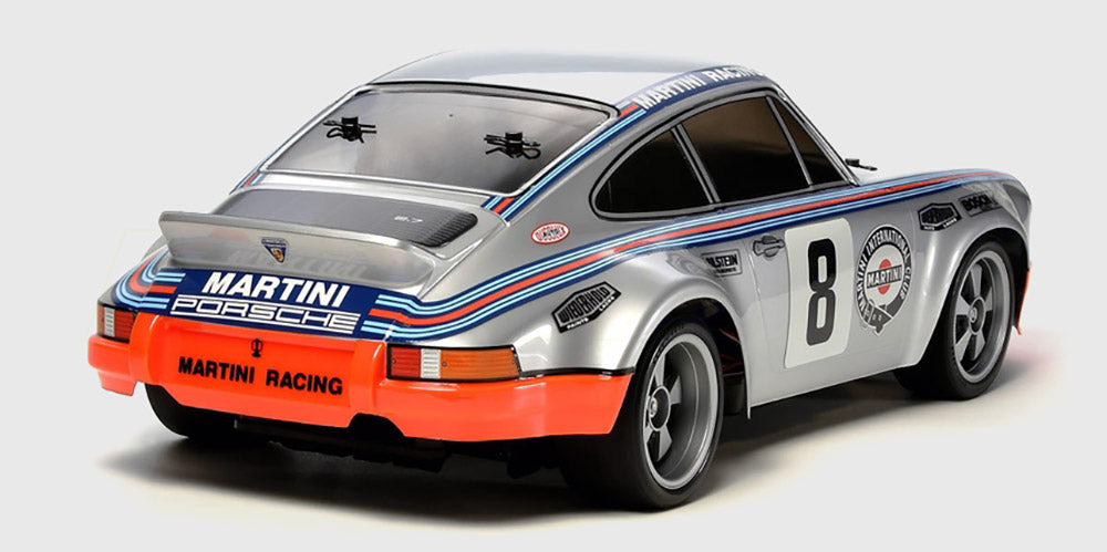 Klassisk hvidt Porsche 911 Carrera RSR karrosseri med blå og røde fartstriber til 190mm fjernstyret bil.