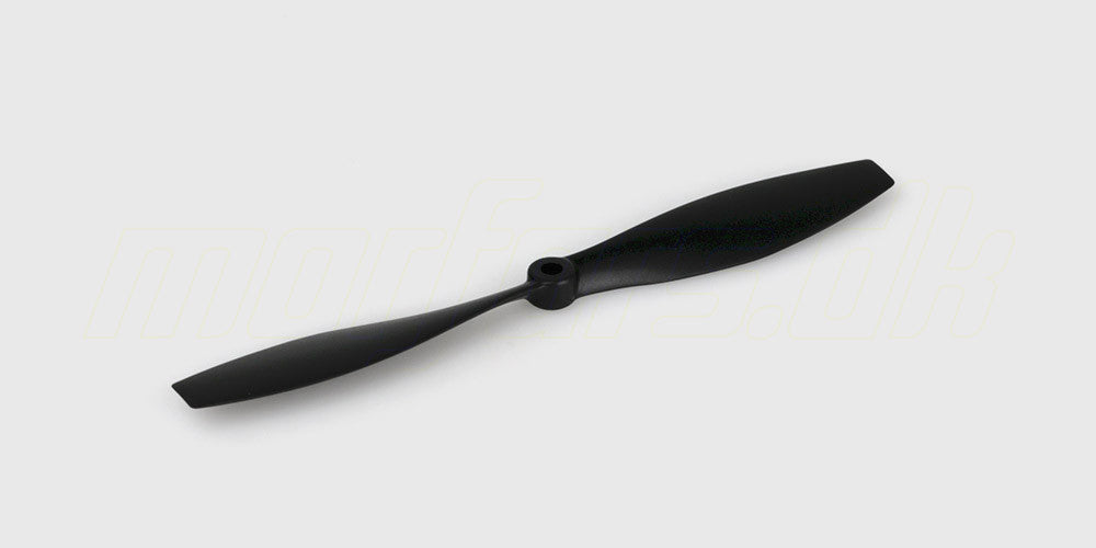 Sort reservepropel til WLtoys F949 Cessna fjernstyret fly liggende på en hvid baggrund.